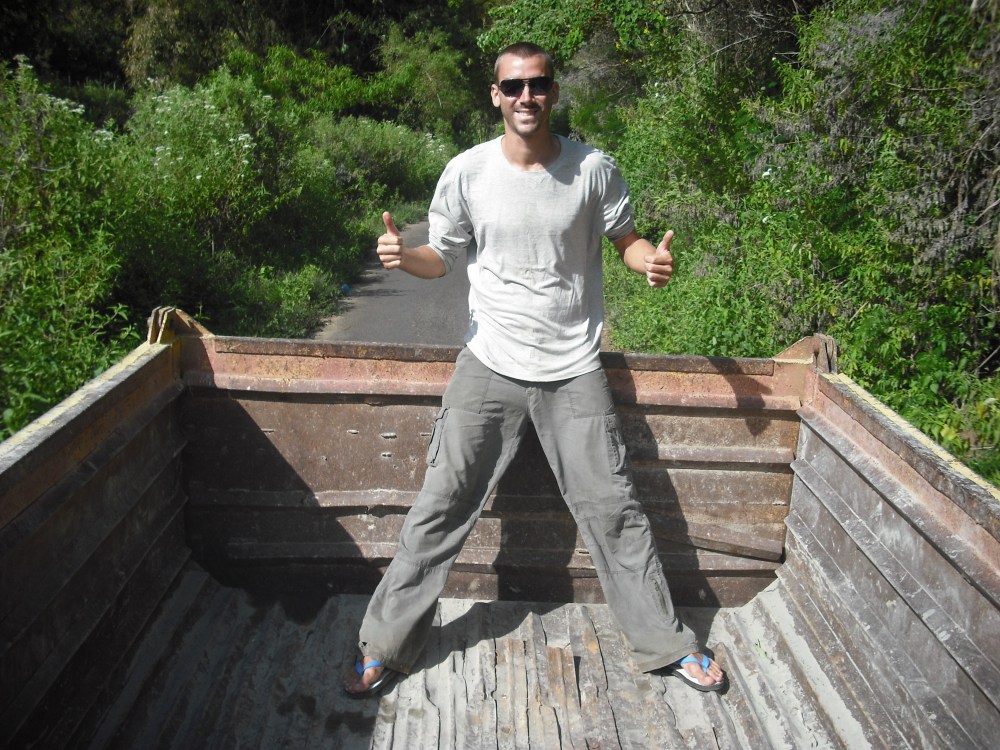 Craig in the back of the open truck